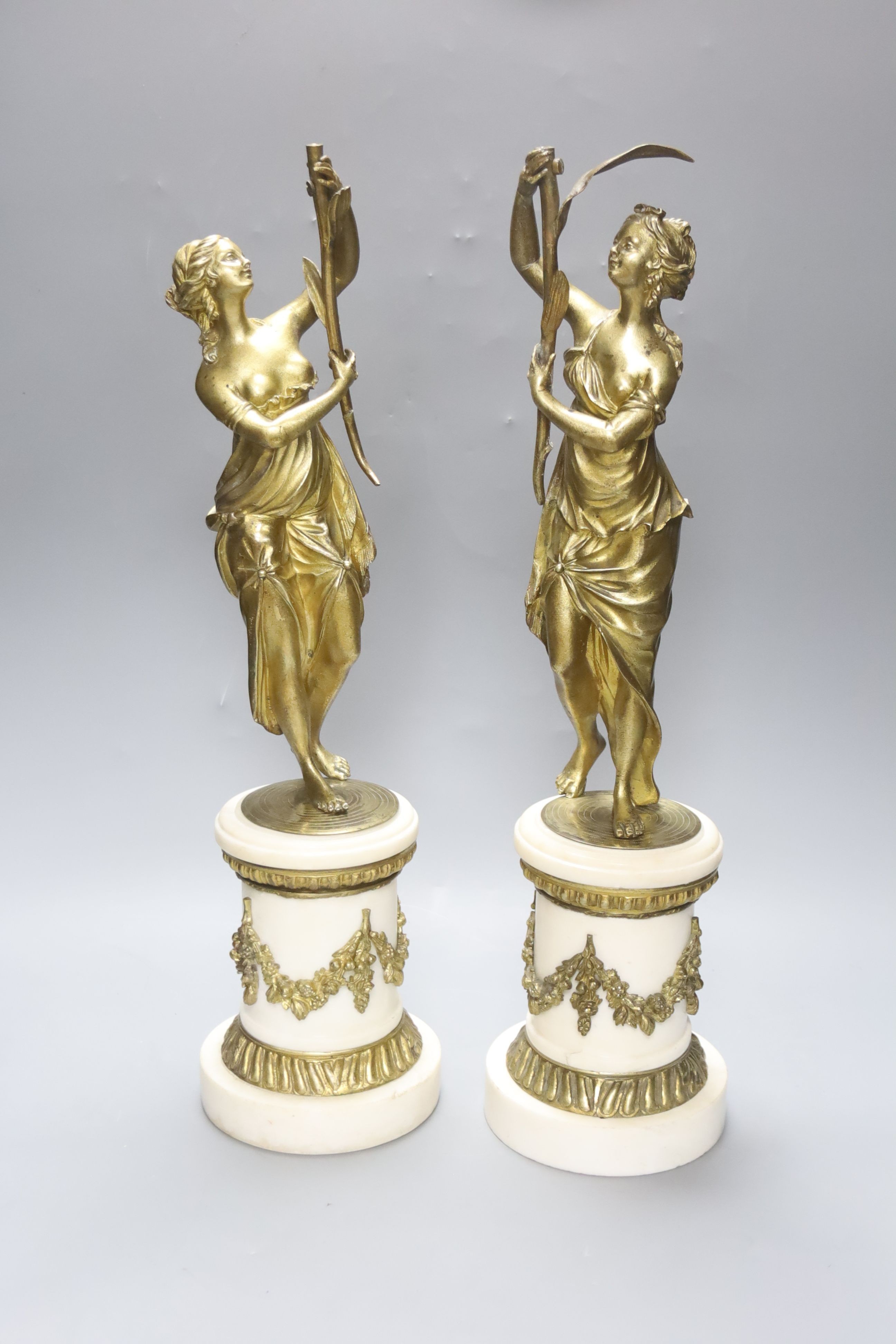 Two French 19th century gilt bronze and white marble figural lamp bases, 47cm